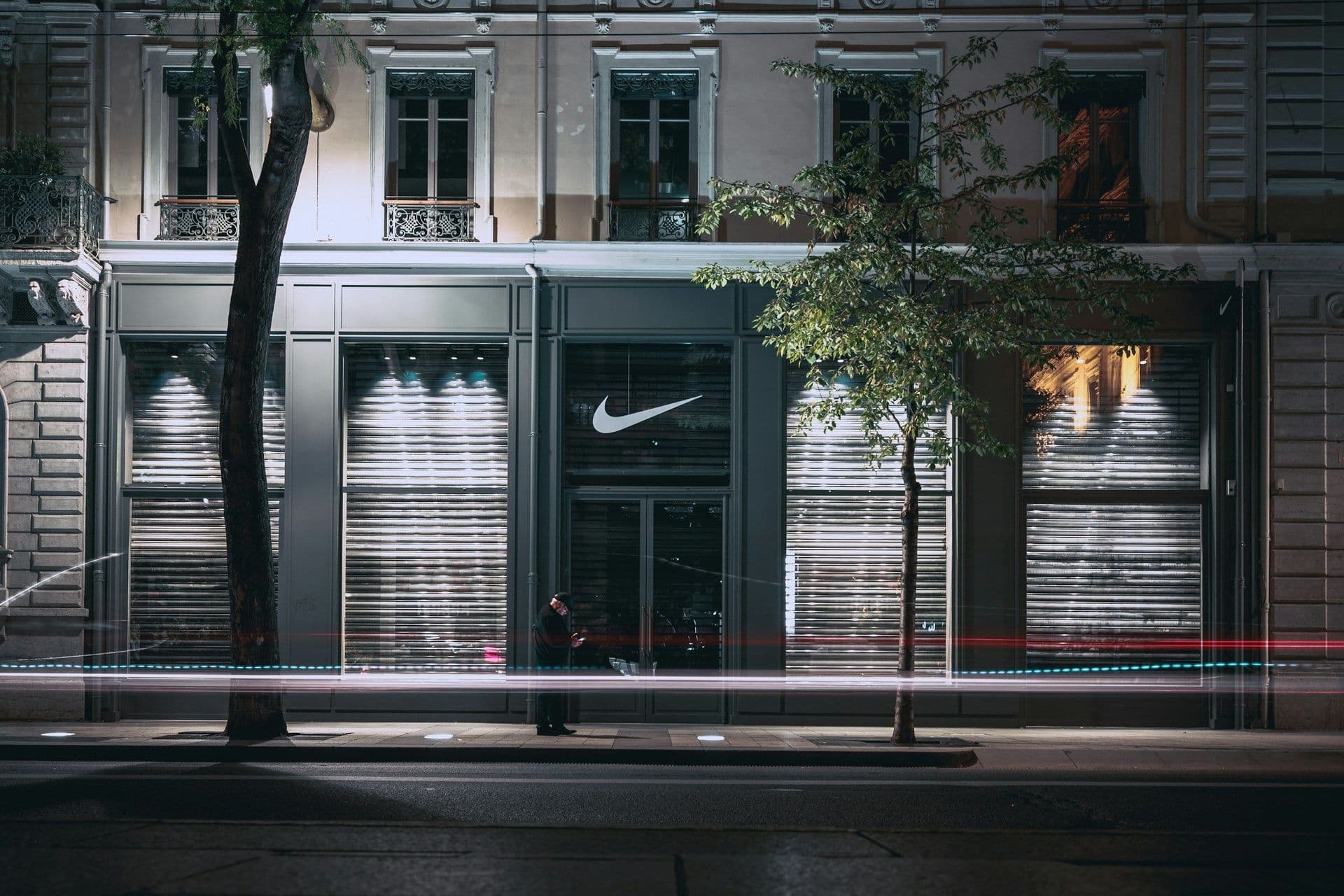 logo of a successful brand Nike on a storefront window