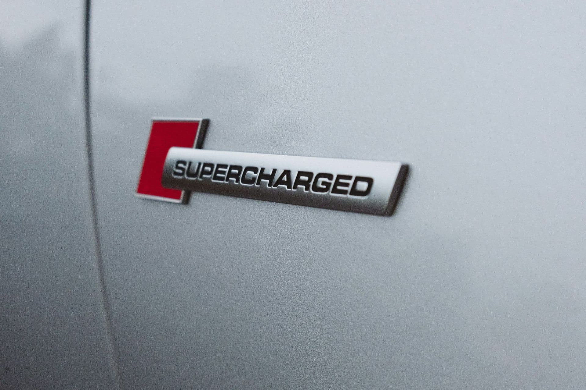 supercharged emblem on vehicle, metaphor for very fast web experience